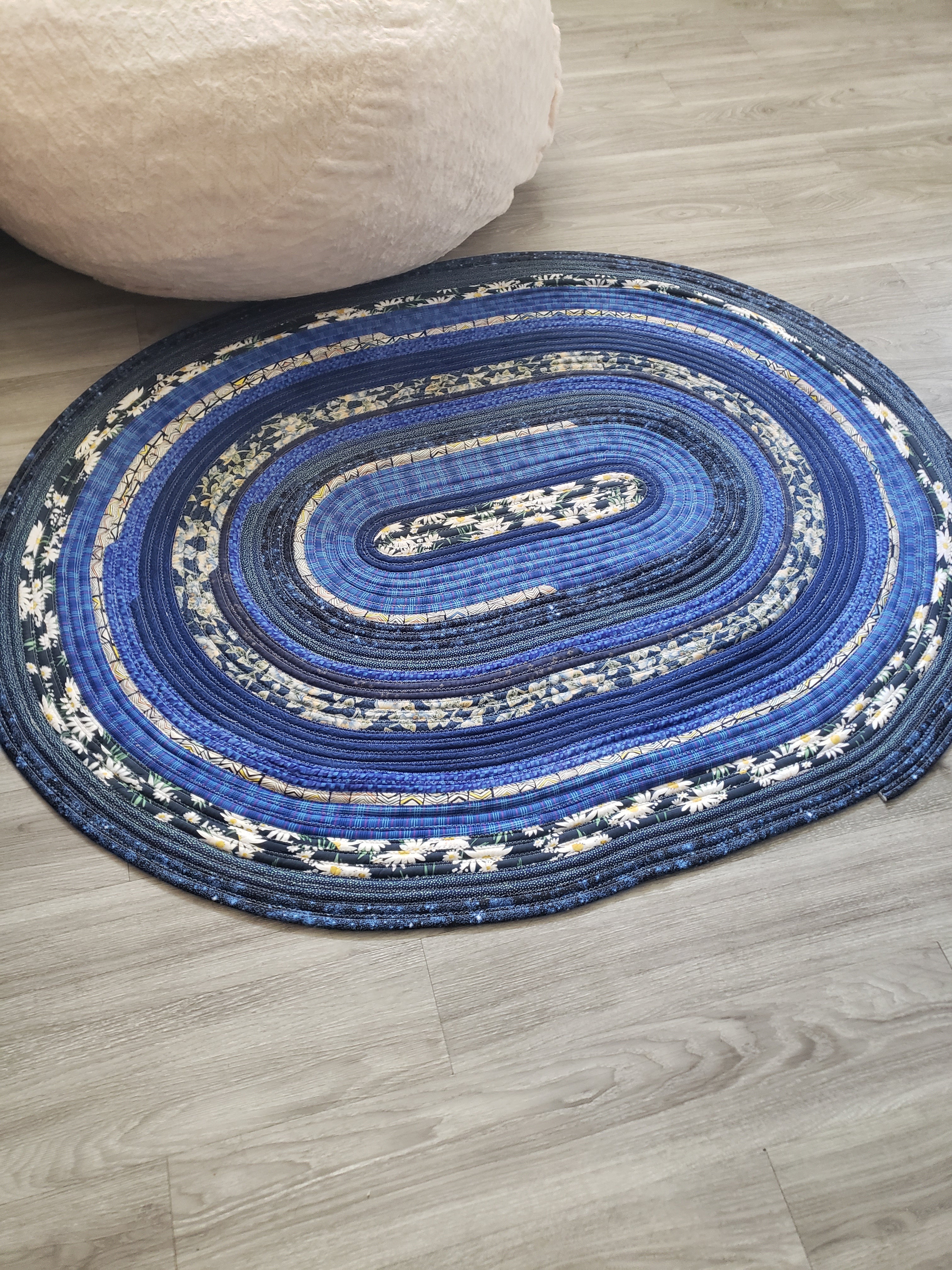 The Tea Is Wild oval rug close-up detail of coiled fabric strips